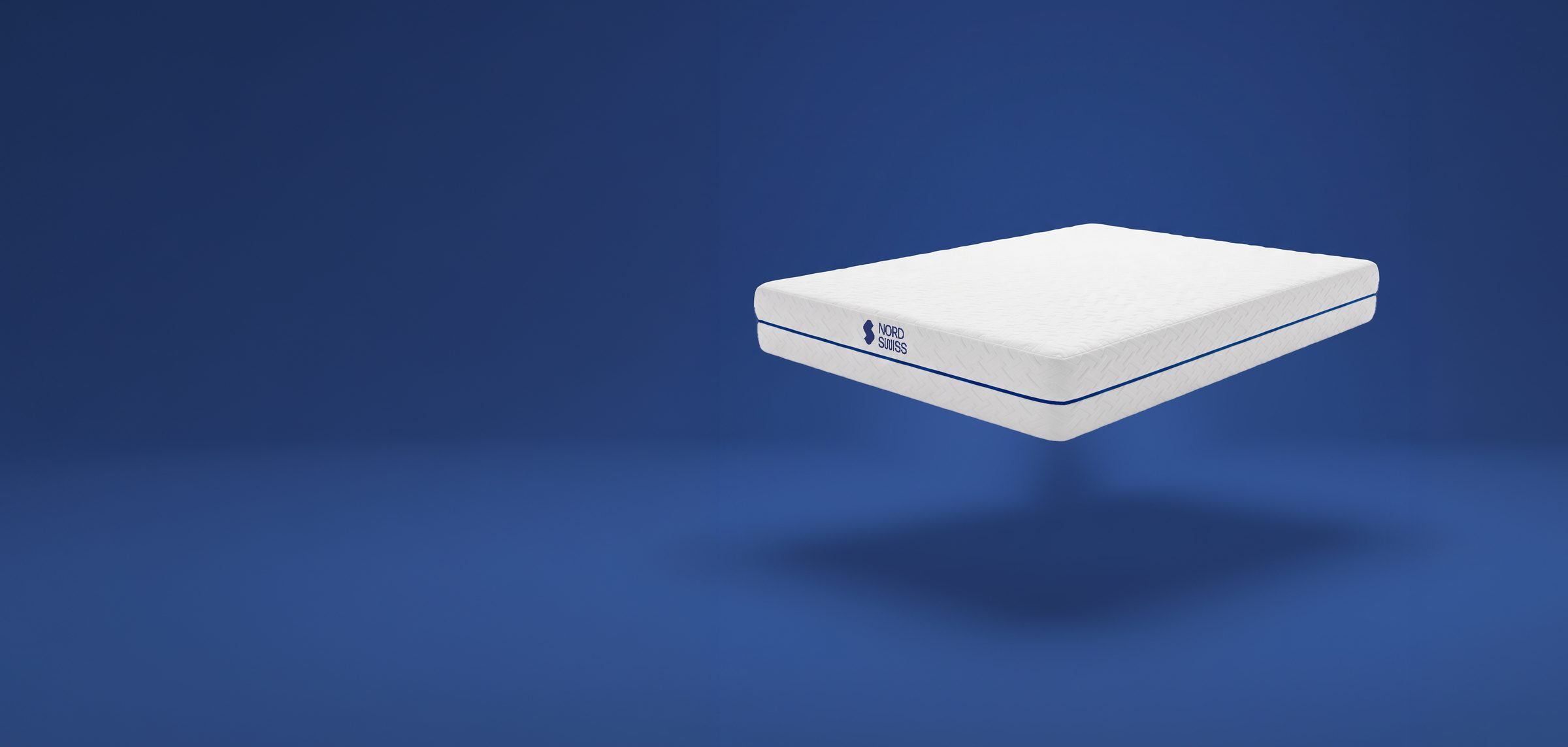 NORD SWISS Hybrid 30 mattress floating on a blue background